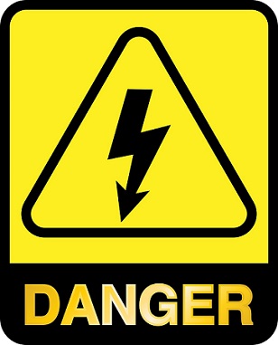Risk of electric shock sign. Photo by Nina Garman from photo website Pixabay.