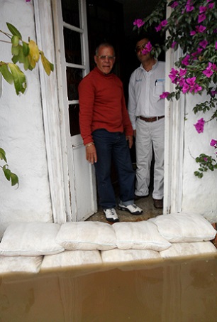 FloodSax alternative sandbags in action keeping filthy floodwater out of this home