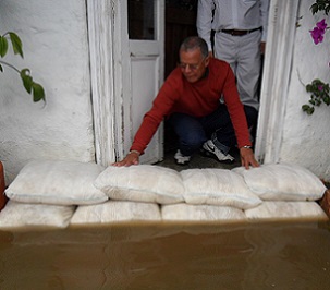 FloodSax alternative sandbags keeping filthy floodwater out of a rented home