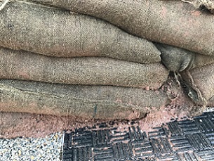 Traditional sandbags quickly rot and the spilled sand harms the environment, clogging up drains