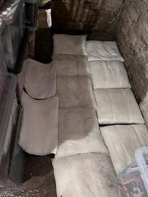 FloodSax alternative sandbags soaking up water the cellar of a cottage in Huddersfield