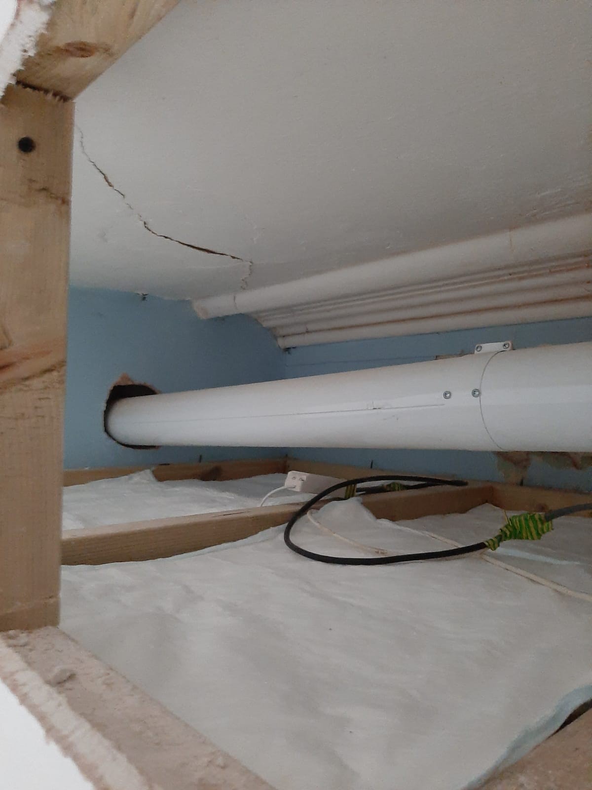 FloodSax beneath the central heating boiler pipe in Christine Butler's flat 2 .jpg
