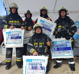 Firefighters with FloodSax alternative sandbags